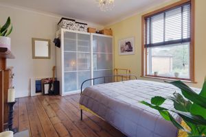 Bedroom One- click for photo gallery